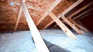 Fiberglass Insulation 5 Loose-fill fiberglass insulation blown into a home's attic.