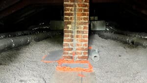 Cellulose Insulation 4 Blown-in, stabilized loose-fill cellulose insulation installed in a home attic.