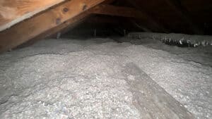 Cellulose Insulation 5 Blown-in, stabilized, loose-fill cellulose insulation installed in a home attic.