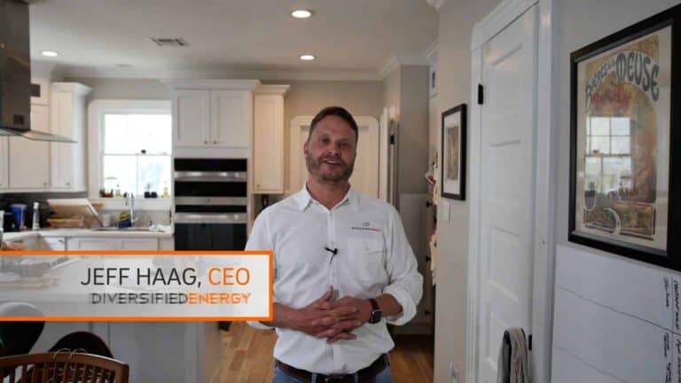 Jeff Haag, owner of Diversified Energy inspects & discusses a leaky HVAC ductwork system in a homeowner's attic.